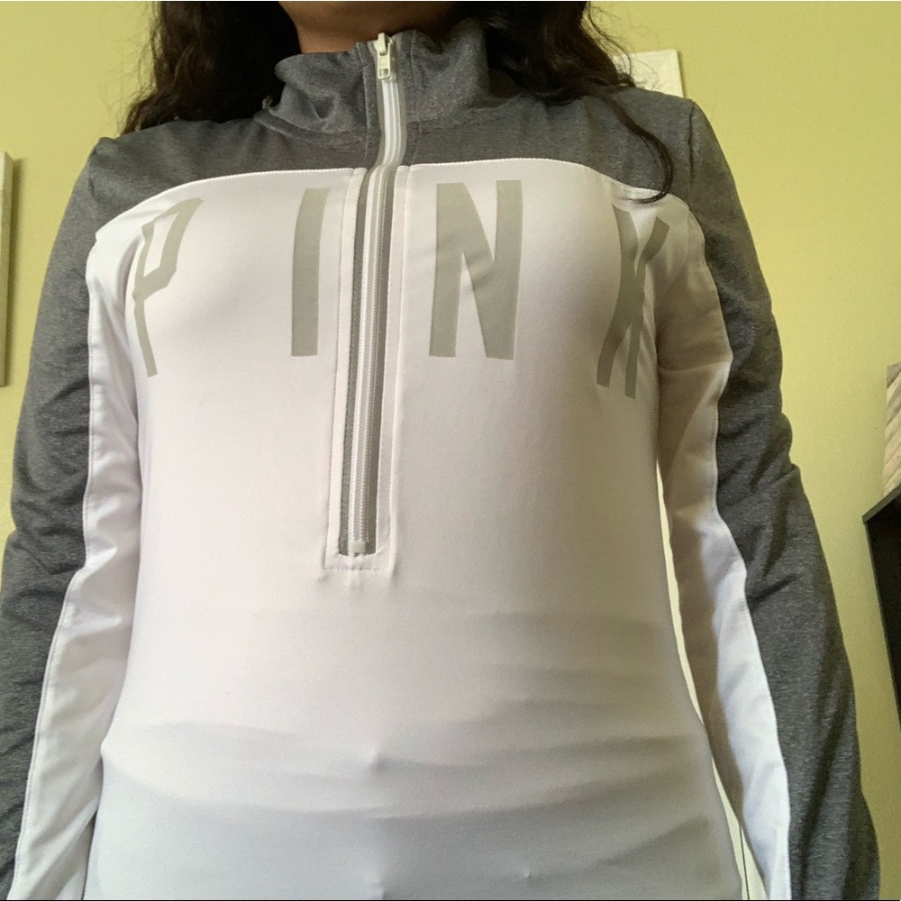 Pink zip up sweater. Size small.